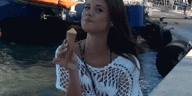 Caprice eating an ice cream
