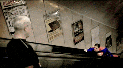 Superman flying on the escalator