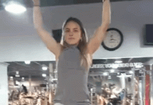 Impressive pull-up by beautiful woman in dress